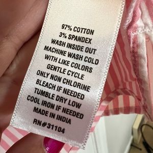 Pink and white button down shirt with small ruffle